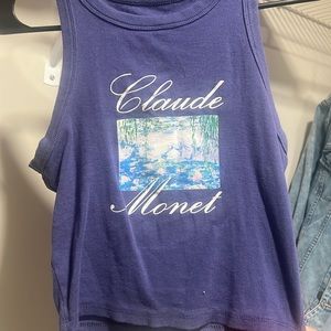 Blue women’s M tank top with Claude Monet painted on it.